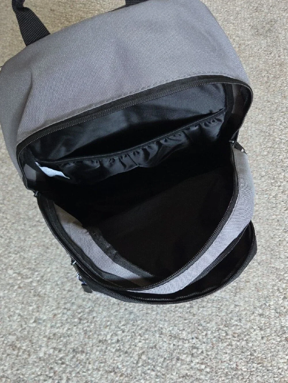 NWOT Eastsport Gray Backpack with Multiple Pockets